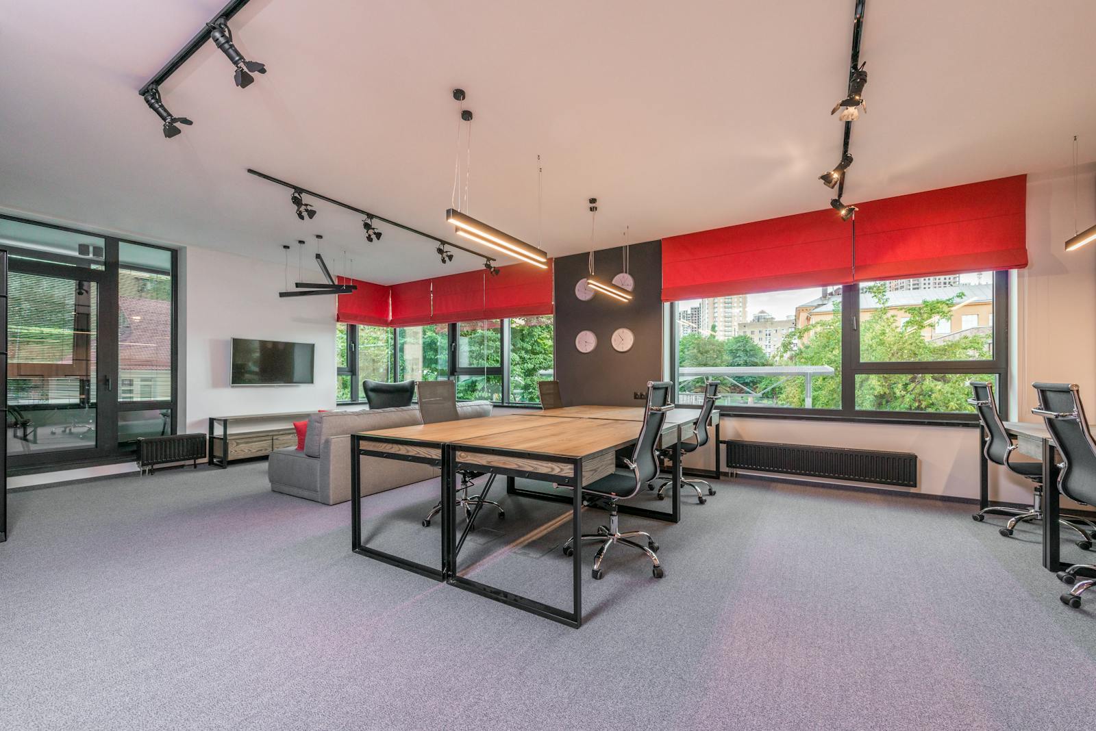Professional installation crew setting up furniture in modern commercial interior